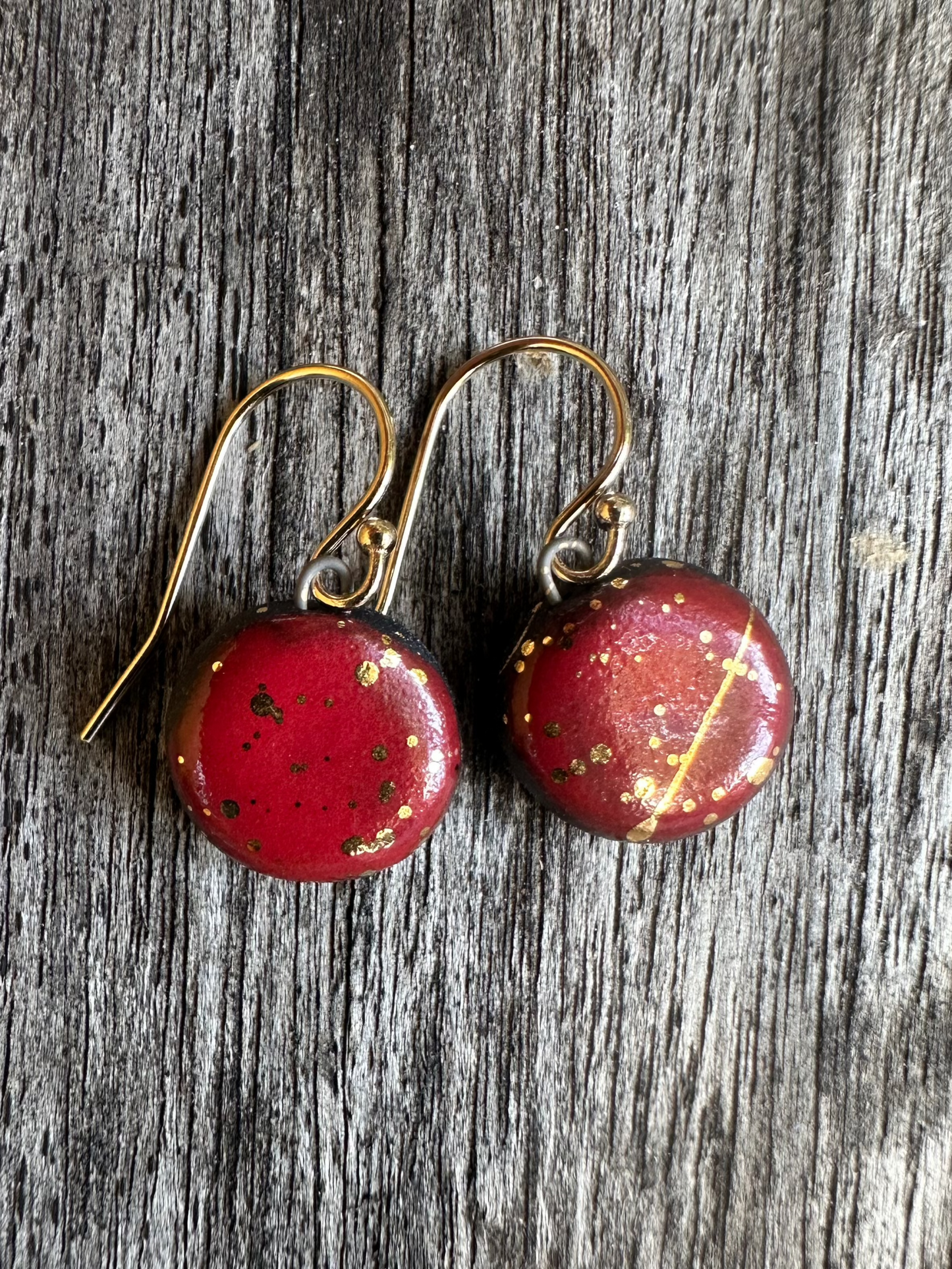 Black Porcelain Earrings: Red and Gold Buttons